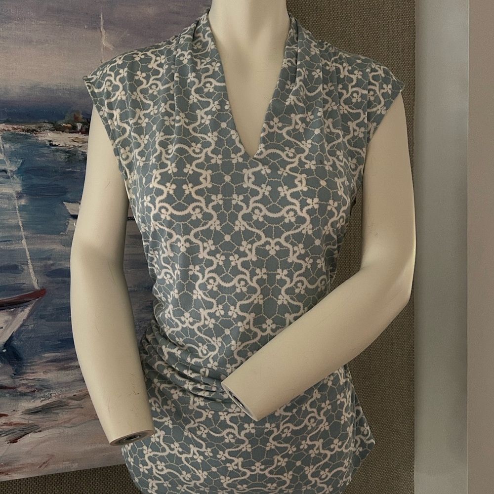 Ann Taylor Aqua blouse great for the office and also cute with white jeans.